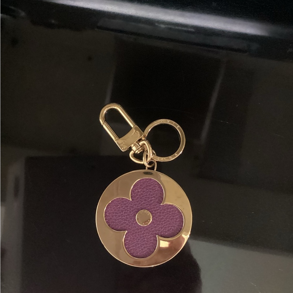 Authentic Louis Vuitton bag charm.